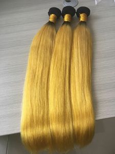 Estensione dei capelli Ombre La trama dei capelli neri e gialli intreccia fasci lisci setosi brasiliani