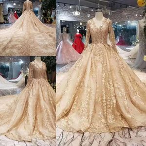 Düğün Altın Elbiseler Tarzı Şampanya V yakalı uzun kollular, parlak kraliyet treni ile geri parti gelinlikleri
