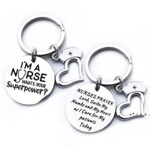 غير القابل للصدأ ممرضة ممرضة المفاتيح ممرضة ممرضة كيرينغ شكل قلب قلادة المفاتيح طالب هدية مجوهرات التبعي