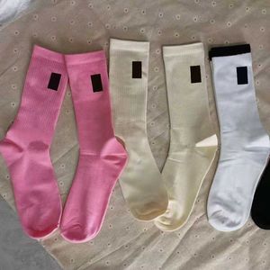 womens socks classic letter high tube Cotton autumn and winter black and white sports casual couple stockings