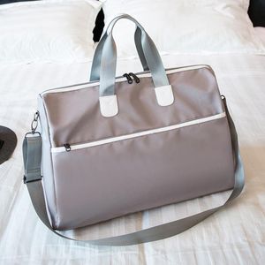Duffel Çanta Kadınlar Seyahat Çantası Erkekler için 2021 Son Stil Büyük Kapasiteli Kadın Taşınabilir Asılı Bavul Bagaj Saklama