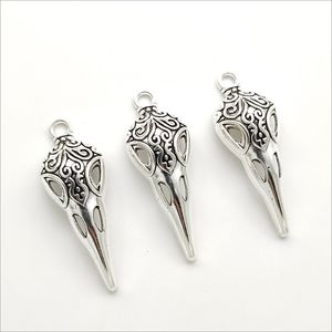 Lot 100 adet Kuş Kafatası Tibet Gümüş Charms Boncuk Kolye takı yapımı için Küpe Kolye Bilezik anahtarlık aksesuarları 35 * 13mm DH0379