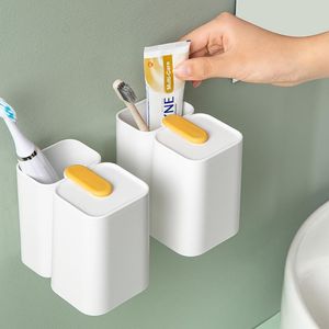 Banyo aksesuarı seti manyetik emme tipi baş aşağı diş fırçası fincan tutucu tarak diş fırçalama duvara monte elektrikli diş macunu rafı
