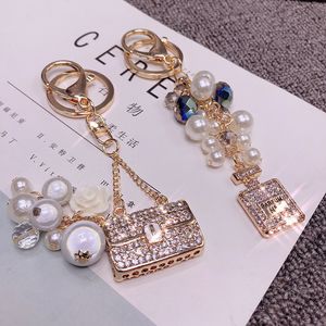 Kreativer Rhinestone-Perlen-Parfümflaschen-Schlüsselanhänger, weibliches koreanisches Autozubehör, Taschenanhänger, Geschenk-Schlüsselanhänger für Mädchen
