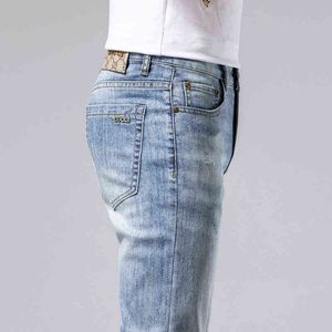 e Primavera Estate Jeans da uomo sottili Coreano Azzurro Elastico Piedini Slim Marchio di moda Alta qualità Doppio g