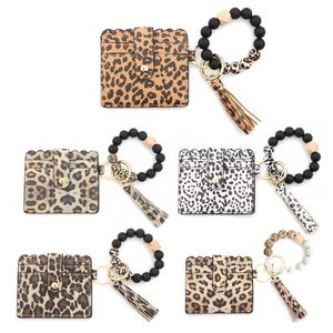 Silikonperlen Schlüsselanhänger Stränge Armband Armband Schlüsselanhänger mit Gepard Leopard Leder Quaste Ausweis Geldbörse Geldbörse Männer Frauen handgefertigt Armreif Schlüsselanhänger Zubehör