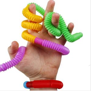 100 шт. Mini Poptube Sensory Fidge Pop Tube Twist Turd Trub Toys Stress Тревога с рельефом Сдавить растягивающие телескопические сильфон