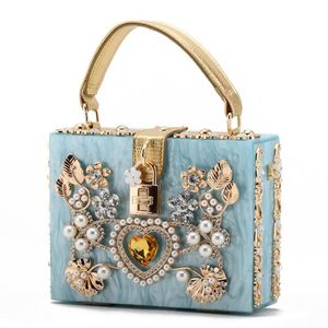 Fabrika toptan kadın çantası yüksek kaliteli akrilik alaşım oyma çanta tatlı ve güzel elmas omuz çantaları zarif mizaç inci boncuk çanta 7 renkler