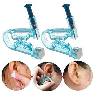 Sağlıklı Güvenlik Steril Tek Kullanımlık Vücut Kulakları Burun Piercing Tabancası Kulak Piercer Aracı Kiti + Paslanmaz Çelik Metal Saplama Küpe