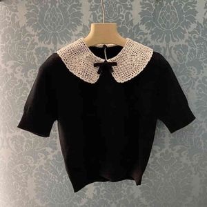 Черный короткий рукавший свитер выдолблен с цветочным крючком кукол, ошейник тонкий подгонка тонкая рубашка на дне весна лето