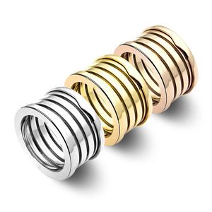 Versione larga 1,2 cm del classico anello di design a molla a cinque strati Moda europea uomo e donna coppia fede nuziale placcata oro 18 carati gioielli in acciaio al titanio 316L