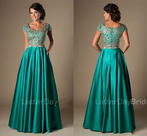 Elegant Turquoise A-Line Prom Gown with Gold Appliques, Cap Sleeves & Floor-Length Skirt for College Formal Events