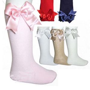 Bebek kızlar diz yüksek çorap çocuklar çocuk sevimli dantel yaylar prenses bacak ısıtıcılar katı pamuk çorap yeni bebek kız uzun çorap 0-4yy