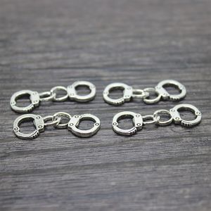 30 pièces lot 31x11mm pendentif à breloque menottes en argent antique 204j