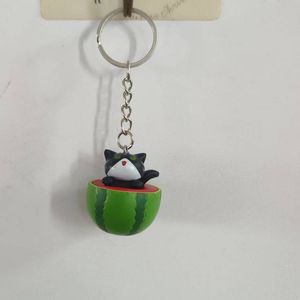 4 pièces pastèque chat riant porte-clés pendentif mignon Anime Figure sac porte-clés Kawaii voiture clés chaîne bibelot dessin animé porte-clés charmes accessoires de mode