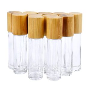 Botellas enrollables de aceite esencial de 5ml y 10ml, botella de Perfume enrollable de vidrio transparente con tapa de bambú Natural, bola de rodillo de acero inoxidable