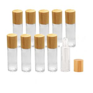 Rollo de vidrio esmerilado en botellas, viales de aceites esenciales con bola de rodillo de Metal y contenedor con tapa de bambú, embalaje cosmético