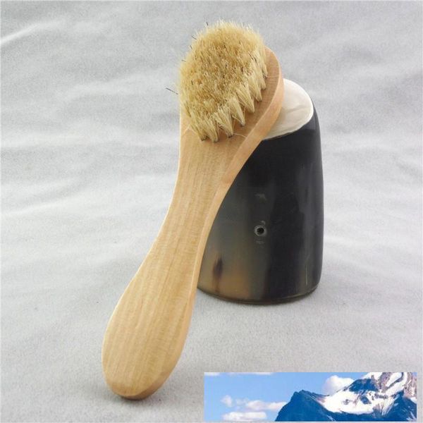 Natural bristle facial brush with wooden handle for gentle exfoliation and cleansing