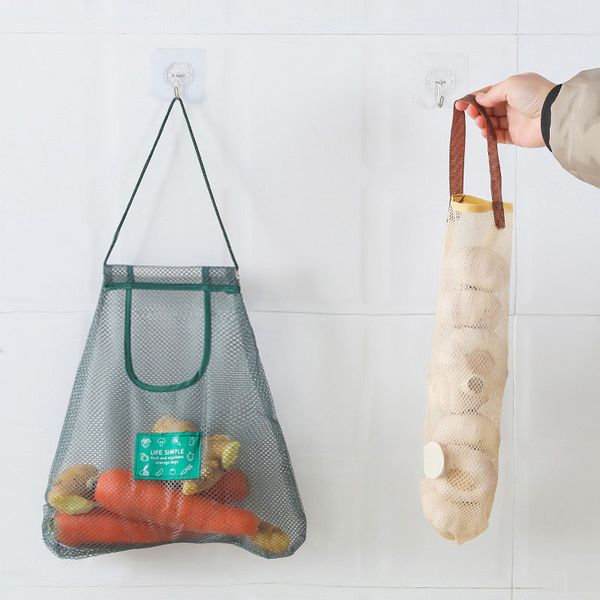 Breathable mesh storage bag for fruits and vegetables, reusable and hollow for kitchen organization  

Reusable net handbag for storing garlic, onions, and other produce with breathable design  

Ventilated mesh pocket organizer for kitchen storage of fruits and vegetables  

Hollow breathable net bag ideal for hanging storage of produce in the kitchen  

Reusable mesh storage bag designed for keeping fruits and vegetables fresh  

Breathable fabric organizer bag for convenient kitchen produce storage  

Ventilated hanging net pocket perfect for storing onions and garlic  

Hollow mesh handbag for organizing and preserving fruits and vegetables  

Reusable breathable storage net ideal for kitchen organization  

Mesh produce bag with hollow design for optimal air circulation