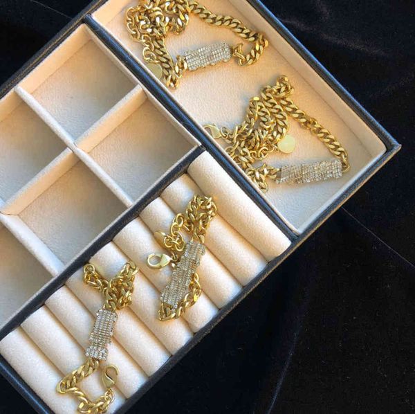 Designer bracelet and necklace jewelry set for women, featuring love letter charms, luxury gold with diamonds, available in blue or green with optional gift box