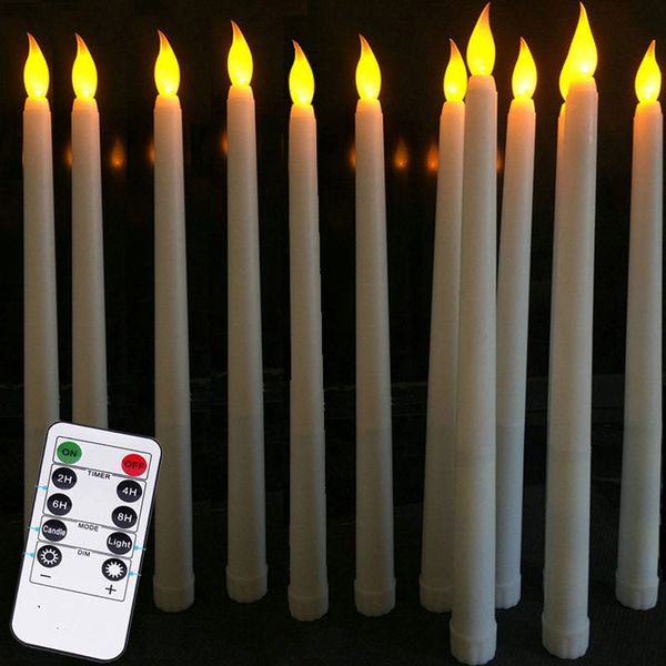 Pack of 12 yellow flickering remote-controlled LED taper candles for party decor