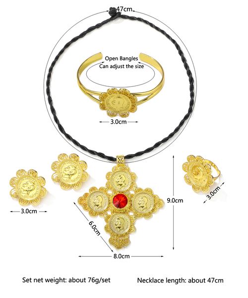 Gold GF African-inspired jewelry set with Diamonte/Diamante and American ruby, including cross pendants, earrings, rings, and bracelets, from Ethiopia/Eritrea