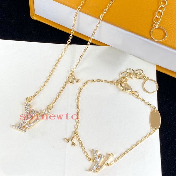 Elegant brass gold earrings for women featuring engraved V initials with sparkling crystal rhinestones, a stylish jewelry set