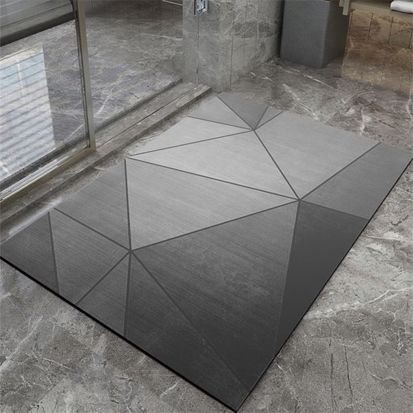 Non-slip geometric bathroom rug for bathtub side with absorbent diatom mud mat design