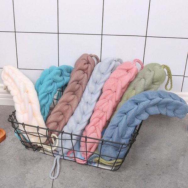 Shower sponge with exfoliating back brush for body and bath, featuring a mesh design and nylon puff for spa-like scrubbing