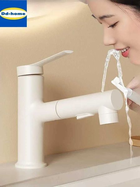Pull-out bathroom sink faucet with hot and cold water control