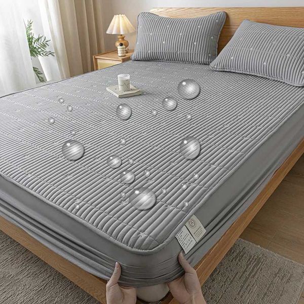 Waterproof thick padded protector with embroidered design, breathable and skin-friendly bed cover, durable for sizes 140/160/180x200