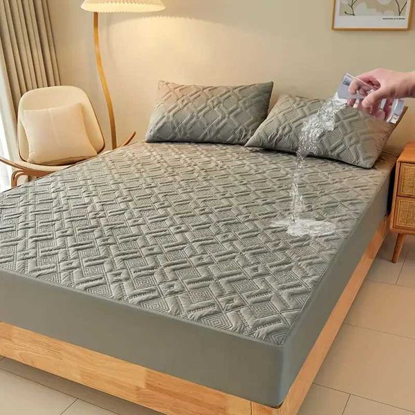 Waterproof solid-color dustproof mattress protector with soft fabric for bedroom and guest room use