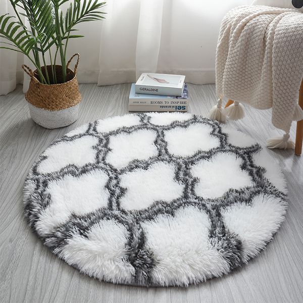 Plush round carpet with fluffy texture, soft and skin-friendly, perfect for living room or bedroom decor, featuring a geometric pattern and non-slip base