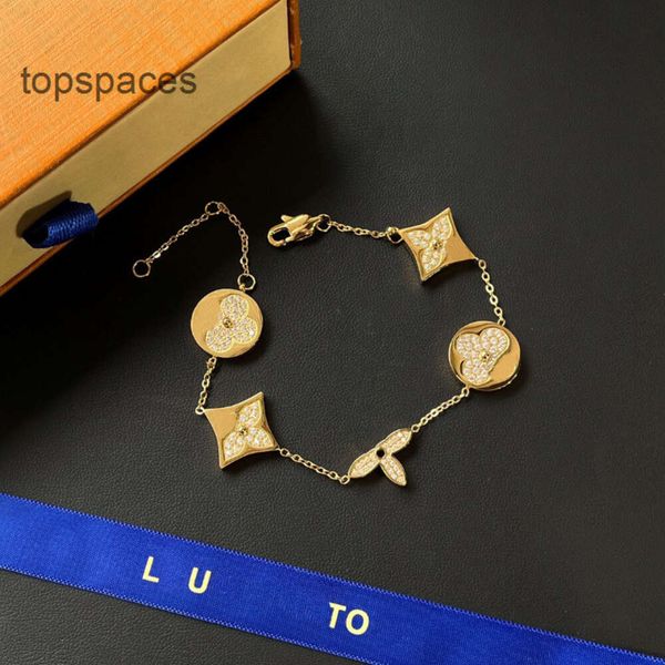18k gold stamped designer jewelry set featuring necklace, earrings, bracelet, and ring with pearl accents in a romantic gift box