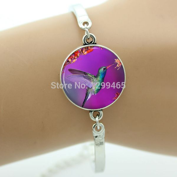 seling jewelry hunger games laugh birds alloy bracelet glass cabochon dome purple bird for women oy-56, Golden;silver
seling jewelry hunger games laugh birds alloy bracelet glass cabochon dome purple bird for women oy-56, Golden;silver