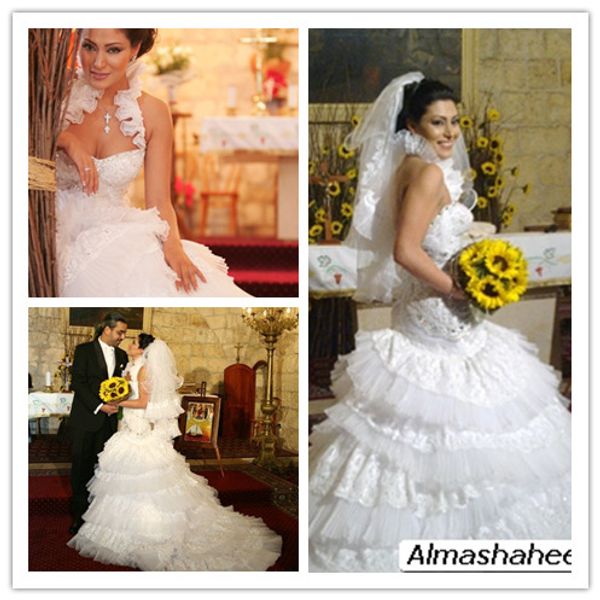 arabic female stars eastern maya nasri wedding gowns dresses tiered skirts crystal beaded muslim brida dresses open back cascading ruffles, White
arabic female stars eastern maya nasri wedding gowns dresses tiered skirts crystal beaded muslim brida dresses open back cascading ruffles, White