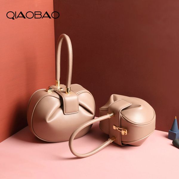 qiaobao new quality genuine leather women bucket handbags ladies solid handle bags vintage bell shape tote bags
qiaobao new quality genuine leather women bucket handbags ladies solid handle bags vintage bell shape tote bags