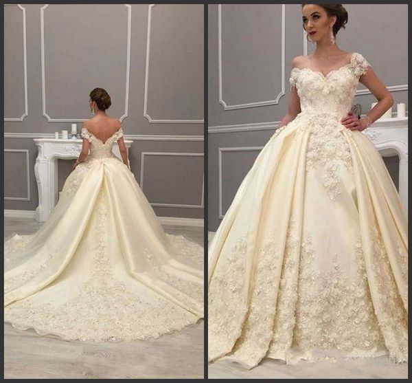 Charming Ball Gown Arabic Wedding Dresses Off Shoulder 3D Flowers Lace Appliques Beaded Backless Arabic Court Train Formal Bridal Gowns
Charming Ball Gown Arabic Wedding Dresses Off Shoulder 3D Flowers Lace Appliques Beaded Backless Arabic Court Train Formal Bridal Gowns