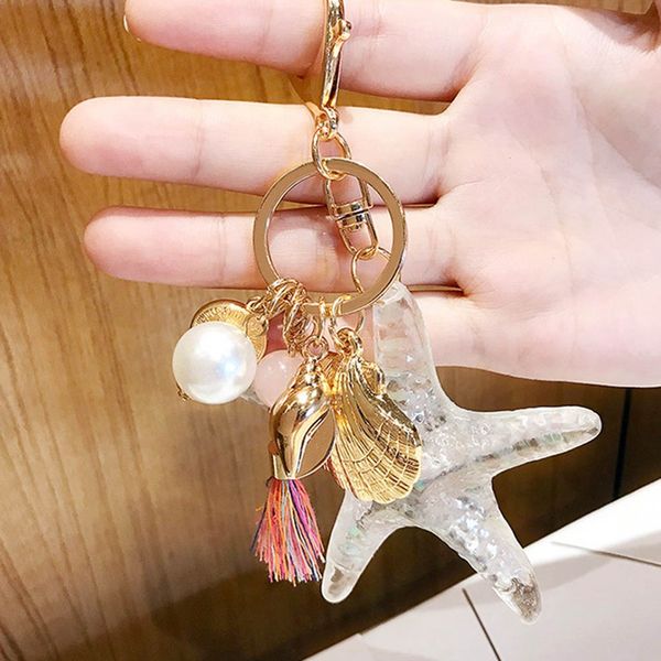new sweet sea starfish pearl shell keychain keyrings for women bag car crystal key chains, Silver
new sweet sea starfish pearl shell keychain keyrings for women bag car crystal key chains, Silver