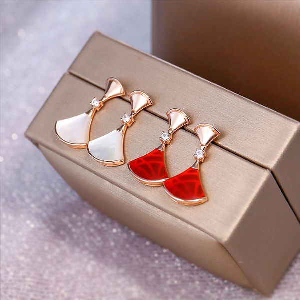 fan-shaped earrings women's japanese and korean wild simple red white zircon small fan luxury earrings holiday gift jewelry, Silver
fan-shaped earrings women's japanese and korean wild simple red white zircon small fan luxury earrings holiday gift jewelry, Silver