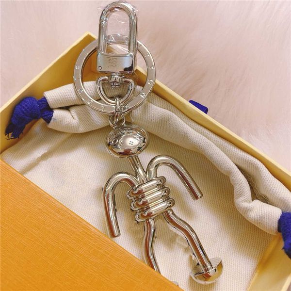 luxury designer figure keychains with box mens women keyring holder key chain car key ring holder souvenir, Silver
luxury designer figure keychains with box mens women keyring holder key chain car key ring holder souvenir, Silver