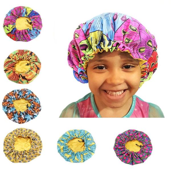 Kids Adjustable African Print Ankara Satin Bonnet Sleep Cap Turban Hat Night Sleep Beanie Chemo Cap
Kids Adjustable African Print Ankara Satin Bonnet Sleep Cap Turban Hat Night Sleep Beanie Chemo Cap