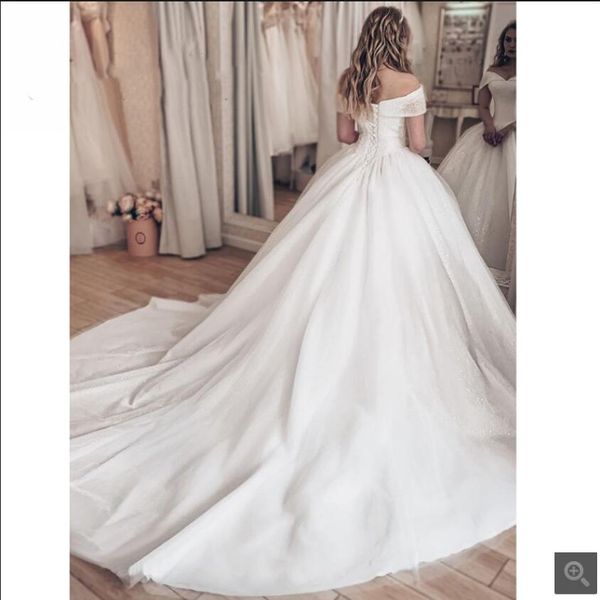 vestido de noiva crystals ball gown wedding dress off the shoulder princess puffy v neck luxury bridal gowns robe de mariage court train, White
vestido de noiva crystals ball gown wedding dress off the shoulder princess puffy v neck luxury bridal gowns robe de mariage court train, White