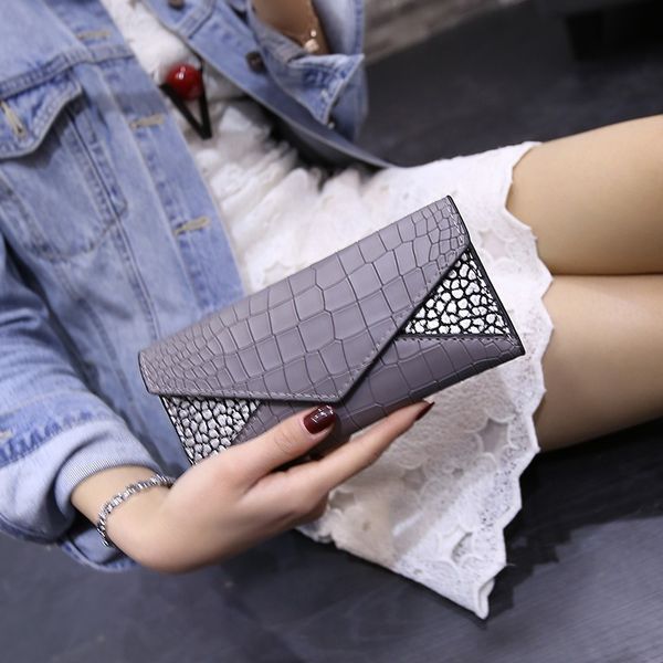 european and american fashion clutch bag spring new women's wallet crocodile pattern triangle stitching small bag women
european and american fashion clutch bag spring new women's wallet crocodile pattern triangle stitching small bag women