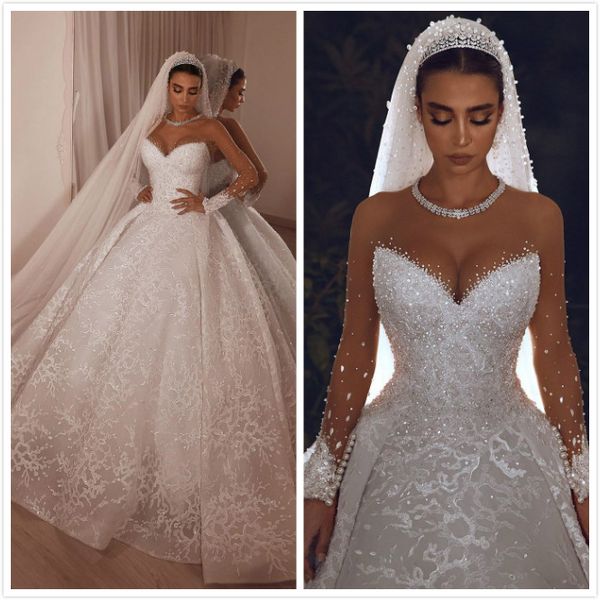arabic aso ebi lace beaded crystals wedding dresses sheer neck long sleeves bridal dresses vintage wedding gowns zj522, White
arabic aso ebi lace beaded crystals wedding dresses sheer neck long sleeves bridal dresses vintage wedding gowns zj522, White