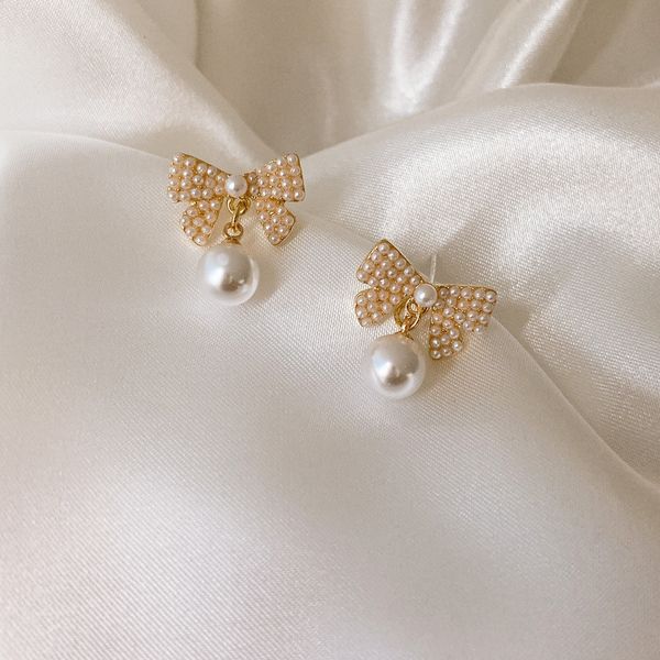 european and american temperament bow pearl earrings female advanced sense net red fashion joker earrings, Silver
european and american temperament bow pearl earrings female advanced sense net red fashion joker earrings, Silver