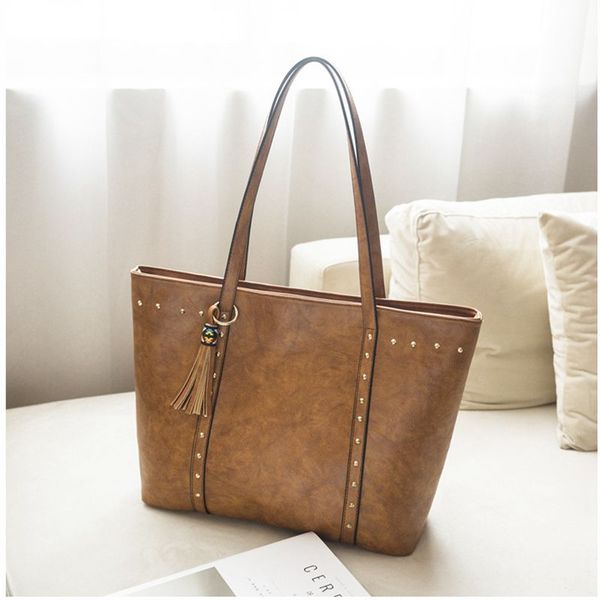 new women's tote handbags leather big bag simple fashion lady retro handbag rivet tassel shoulder messenger bag large pocket
new women's tote handbags leather big bag simple fashion lady retro handbag rivet tassel shoulder messenger bag large pocket