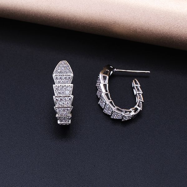 very girl fashion simple snake shaped small stud earrings silver color zircon earrings punk summer style new brand, Golden;silver
very girl fashion simple snake shaped small stud earrings silver color zircon earrings punk summer style new brand, Golden;silver