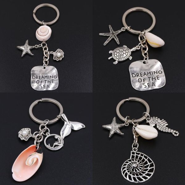 1pc dreaming of the sea keychains starfish conch with shell keyring fish tail charms turtle pendant ocean jewelry, Silver
1pc dreaming of the sea keychains starfish conch with shell keyring fish tail charms turtle pendant ocean jewelry, Silver
