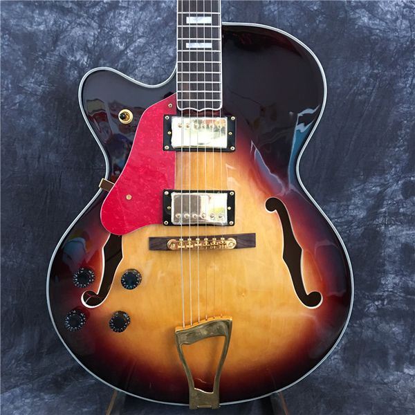 left-hand custom shop semi-hollow body jazz electric guitar with vibrato golden hardware
left-hand custom shop semi-hollow body jazz electric guitar with vibrato golden hardware